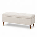 Banco de almacenamiento de lino beige con patas de madera y metal