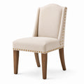 Silla de comedor de tela beige con patas de roble